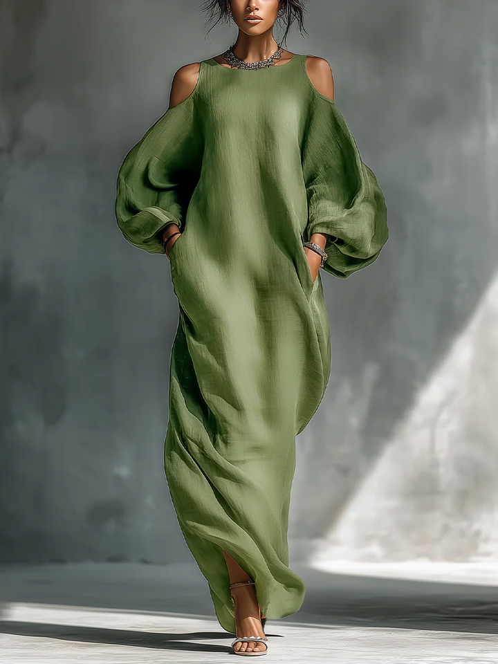 Selena | Vestido largo verde fluido con hombros descubiertos y mangas amplias
